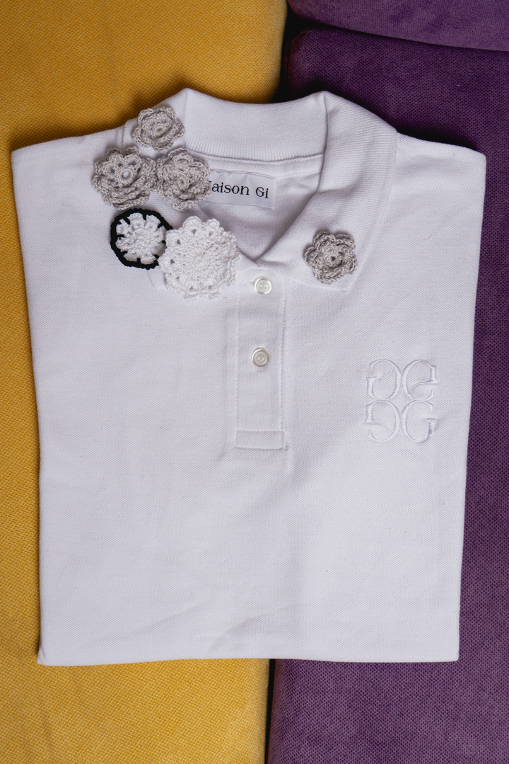 Polo in cotone con fiori